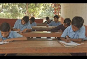 Boys pen down their experiences and learnings at the end of the camp.