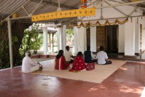 Devotees have personal meditation at Shiva Mandir.