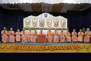 Swami Smaranananda leads the prayer.