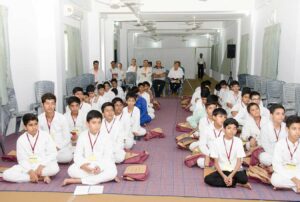 Children are engrossed during one of the “How-to-Live” sessions.