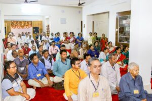 Devotees attending the talk.