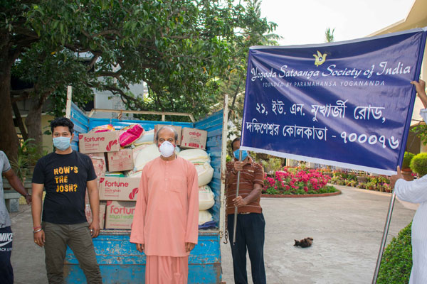 Swami Achyutananda with relief packets in Dakshineswar