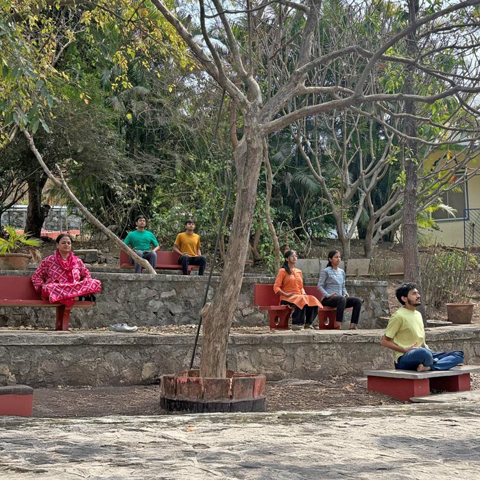 YSS Pune Retreat – Devotees Meditating Outdoors