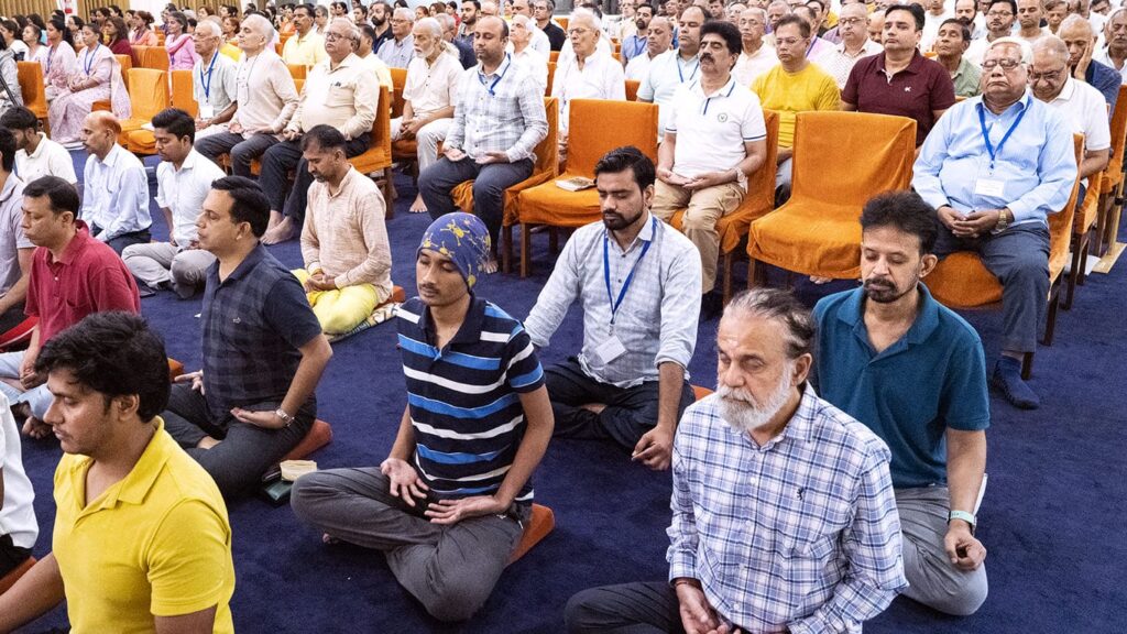 Devotees in group meditation