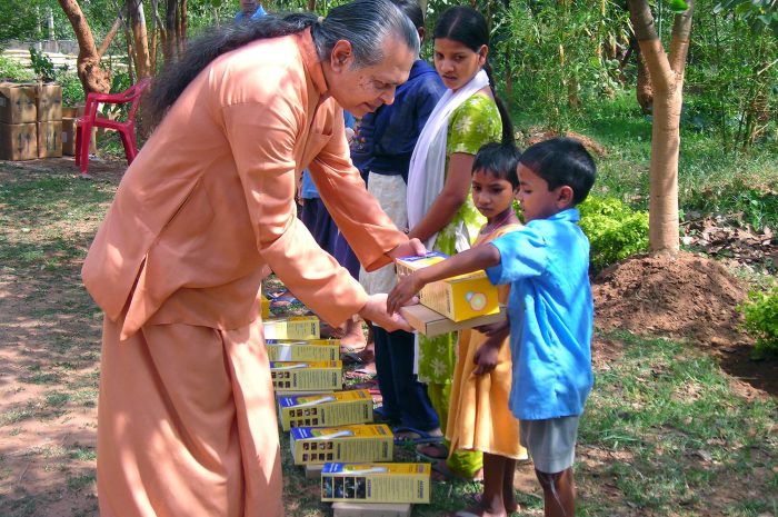 2012_Monks_Ranchi_0059 A YSS monk distributes Essential Items to the Needy